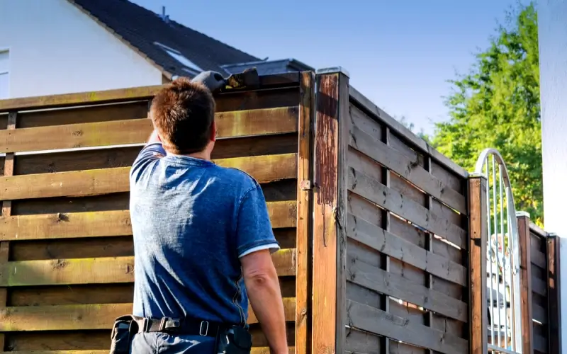 slatted fence building in summer